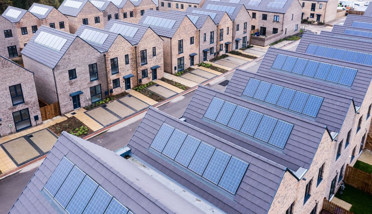 Solar panels mounted on roofs on homes in the UK