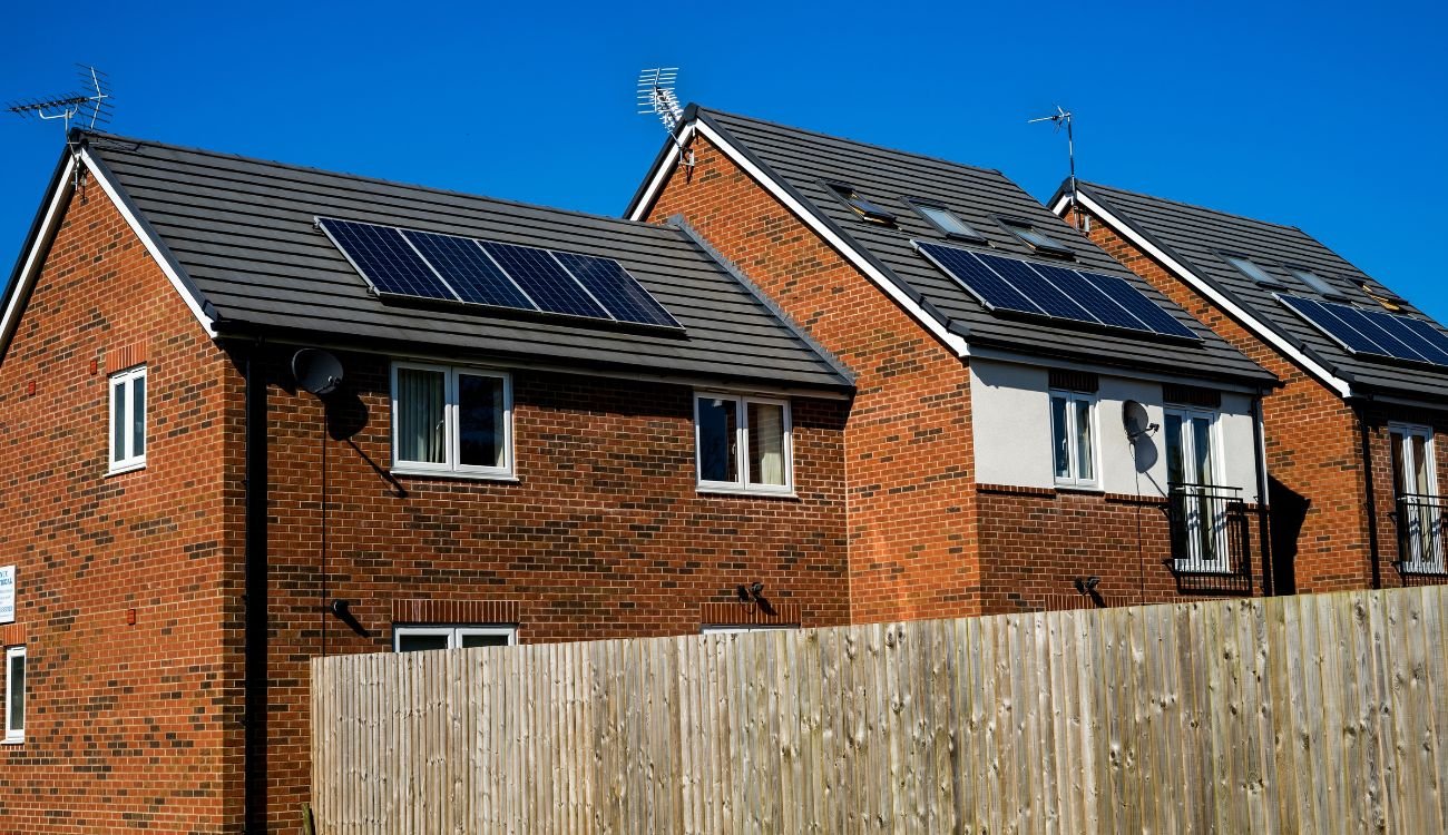 Three homes in the UK with 4 solar panels installed on all three roofs