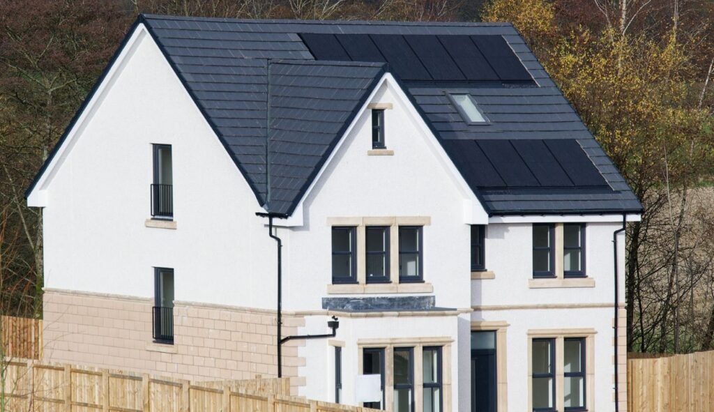 Solar panels mounted and installed on a roof on a house in the UK